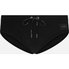 Dolce & Gabbana Men Swimwear Dolce & Gabbana Swim Briefs With High-cut Leg And Branded Metal Plate Man Beachwear Black Jersey