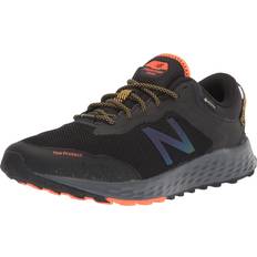 New Balance Sportssko New Balance Men's Fresh Foam Arishi V1 Trail Running Shoe, Black/Lead/Dynomite