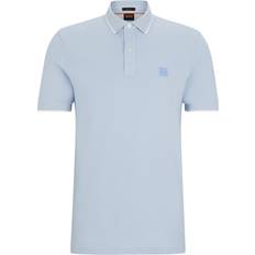 Oberteile BOSS Slim-fit polo shirt in washed stretch-cotton piqué Light Blue