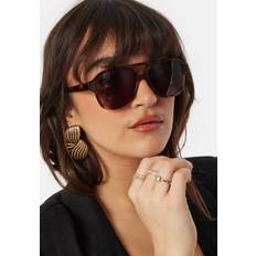 Corlin Eyewear Solglasögon Corlin Eyewear Gelo Tortoise Brown One