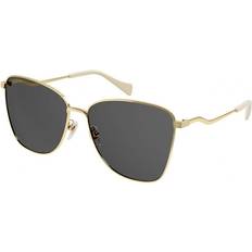 Solglasögon Gucci Sonnenbrille GG0970S-001 gold