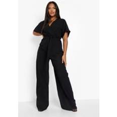 Boohoo Jumpsuits & Overalls boohoo Plus Woven Belted Wide Leg Jumpsuit Black