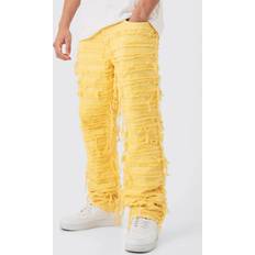 Keltainen Farkut boohooMAN Relaxed Rigid Hyper Distressed Overdye Denim Jean - Yellow