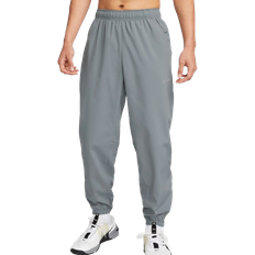 Nike Form Men's Dri FIT Tapered Versatile Pants - Smoke Grey/Black