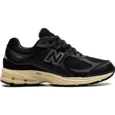 New Balance Svarta Sneakers New Balance M2002R M - Vintage Black/White