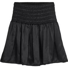 Kjol Lilian Smock Black år 140 Kjol