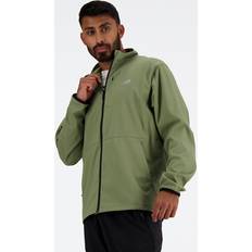 New Balance Outerwear New Balance Stretch Woven Jacket In Green Polywoven