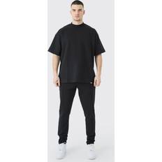 Housut boohooMAN Oversized T-shirt and Taper Jogger Set - Black