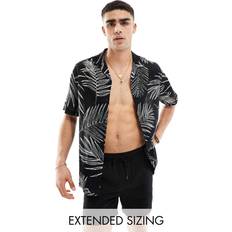 Unisex Shirts ASOS DESIGN Relaxed Revere Shirt With Leaf Print - Black