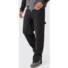 boohooMAN Relaxed Overdye Carpenter Split Hem Trouser - Black