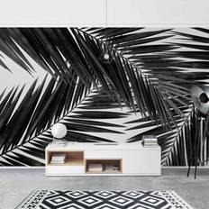 Papeles pintados Klebefieber Wallpaper View Over Palm Leaves Black And White