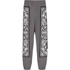 Balmain Herr Byxor Balmain Viskos Avslappnade Byxor Med Mini Monogramtryck - Svart