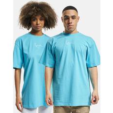 Lyseblå oversized t-shirt med lille signatur og print på ryggen