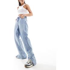 Sixth June – Tief sitzende Jeans in Blau mit Acid-Waschung, weitem Bein geschlitztem Saum