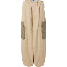 Men - W25 Trousers HUGO Oversized-fit parachute trousers in cotton with cargo pockets Light Beige