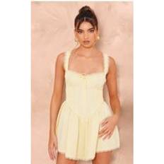 Yellow Jumpsuits & Overalls PrettyLittleThing Lemon Woven Corset Lace Trim Romper