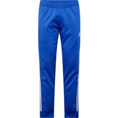 Skinny - Unisex Bukser adidas Sst Track Pant - Semi Lucid Blue
