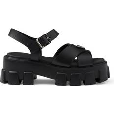 Prada Tossut ja Sandaalit Prada Monolith Crisscross Ankle-Strap Chunky Sandal - Black