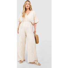 Boohoo Jumpsuits & Overalls boohoo Womens Plus Textured Plunge Belted Jumpsuit Beige