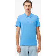 Poloshirts Lacoste Normal geschnittenes Polohemd aus Baumwollmischgewebe. Blau