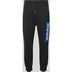 HUGO Cotton-terry tracksuit bottoms with logo print