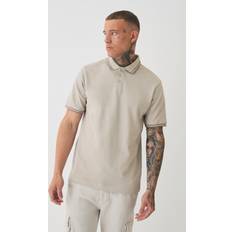 Beige Polos boohooMAN Tall Slim Tipped Pique Polo - Stone