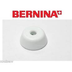 sewing machine thread retaining spool cap/disk medium