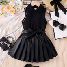 Övriga sets på rea Shein Young Girls" Black Sleeveless Top With Collar And Belted Pleated Skirt Set For Summer