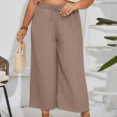 Shein Plus VacationSolid Color Textured LaceUp Cropped WideLeg Pants