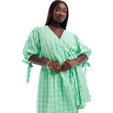 ASOS Klänningar ASOS ASOS DESIGN Curve Ginghamrutig miniklänning med smock och omlottdesign-Flera