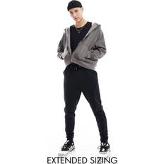 Skinny - Vuxen Byxor ASOS DESIGN Essential Svarta, skinny mjukisbyxor oversize-Svart/a