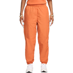 Nike Nocta Northstar Nylon Track Pants - Hot Curry/Orange Trance