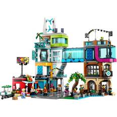 LEGO City Stadskärna Modellbyggsats med Modulära Rum och Minifigurer, Byggleksak för Barn, Innehåller Bland Annat Leksaksbutik, Frisörsalong, Hotell, Vlog-studio, Takdisko, Presentidé från 8 år 60380