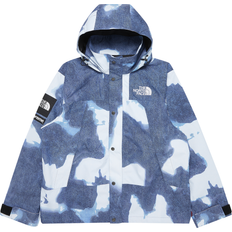 Supreme Outerwear Supreme x The North Face bleached denim-print mountain jacket unisex Cotton/Polyester Blue