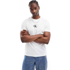 Calvin Klein Beige Overdele Calvin Klein Hvid T-shirt med monogramlogo