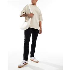 Wrangler Bryson Svarta, tvättade, skinny jeans-Svart/a