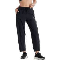 New Balance Byxor New Balance Sport Essentials Perf Woven Pant