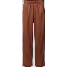 Donna - Marrone Pantaloni & Shorts adidas Originals Adicolor Baggy Firebird Track Pants, Brown