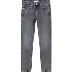 Calvin Klein Brown Trousers & Shorts Calvin Klein Slim Fit Tapered Jeans - Denim