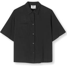 Mads Nørgaard Blusar Mads Nørgaard Shirts, female, Black, Boxy Blouse with Pocket and Button Closure
