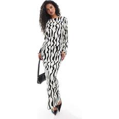 Yas textured jersey maxi dress with fluted sleeves in mono print BLACK