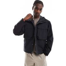 The North Face M66 Ripstop waterproof utlilty pocket jacket in black