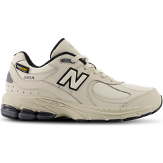 New Balance Beige Sport Shoes New Balance Stone 2002 Youth Trainers - Brown