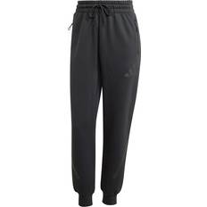 Adidas Byxor adidas Z.N.E W Mjukisbyxor - Black
