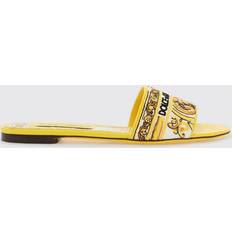 Dolce & Gabbana Sloffen en Sandalen Dolce & Gabbana Flat Sandals With Embroidered Majolica Yellow