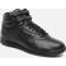 Reebok Scarpe da Palestra e Allenamento Reebok Freestyle Hi Damen Schwarz Sneaker Turnschuhe