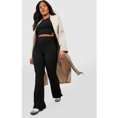 Boohoo Trousers boohoo Basics Plus Ribbed High Waisted Flare Trousers - Black