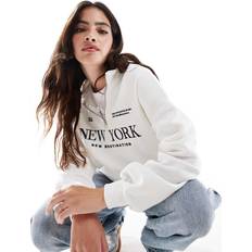 Stradivarius 'New York' slogan quarter zip sweatshirt in ecru-Neutral