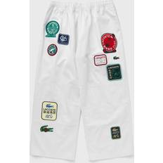 Lacoste Pantaloni & Shorts Lacoste X Clot PANTALON DE SURVETEMENT men Casual Pants white in size:M