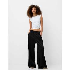 Clothing Bershka wide leg piping detail sweatpants in black